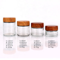 hot sell 1oz 3oz 4oz wide mouth clear glass child resistant jar with wooden transfered printed plastic screw lid